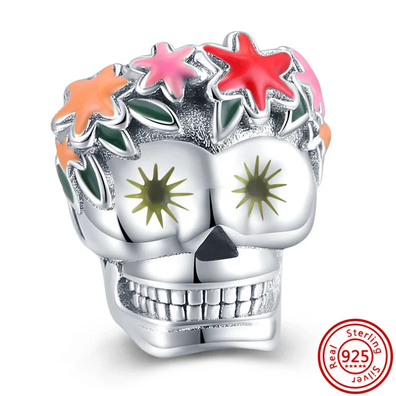 Dije de calavera con flores de Halloween